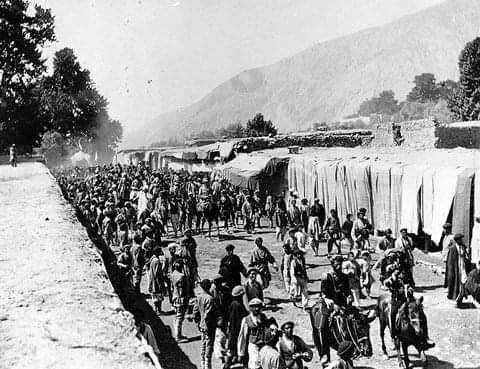 Lt. Col. Sir George Roos-Keppel is welcome to Chitral in the bazar in 1919