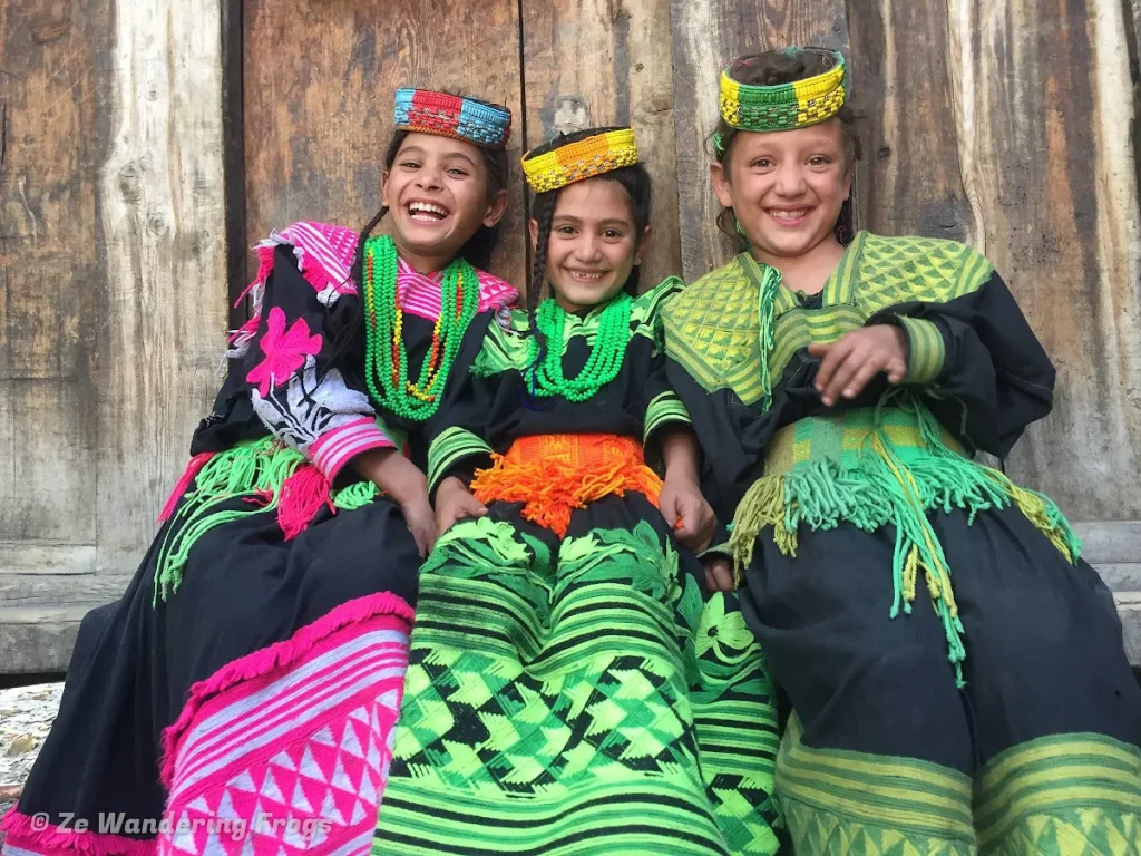 Kalash children from Kalash community in their traditional colorful attire