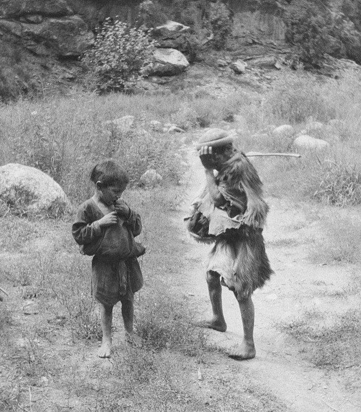 Kafir boys from the Kati tribe in Urtsun valley Chitral wearing a goat's skin in 1929 Georg Morgenstiern